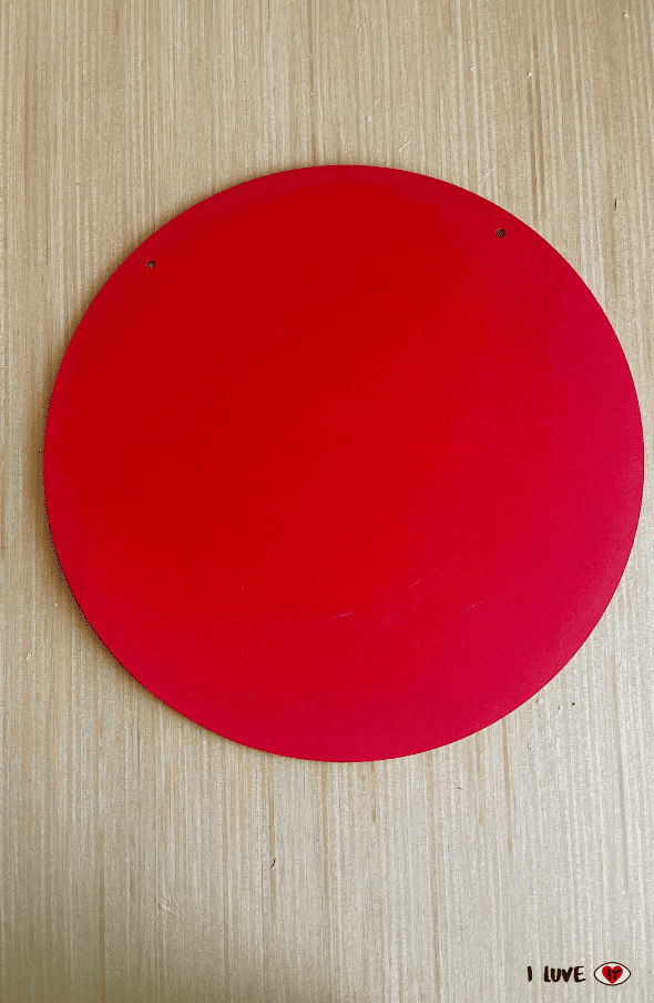 red painted wood round